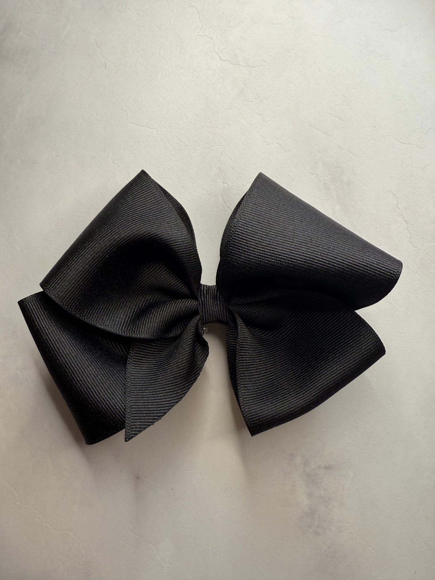 Black bow with tail