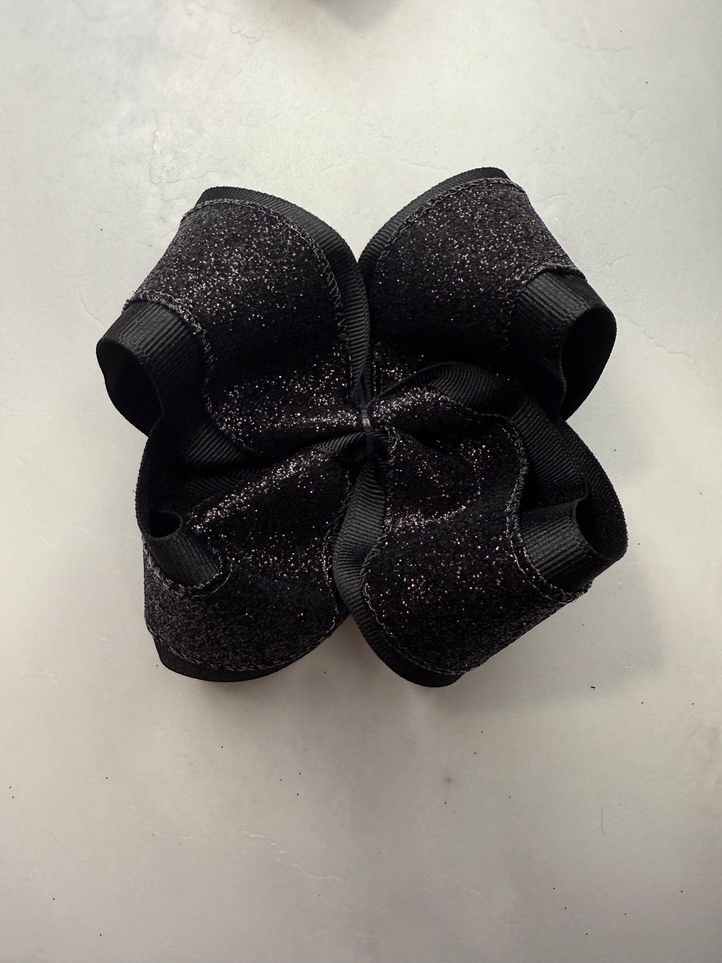 Black glitter bow